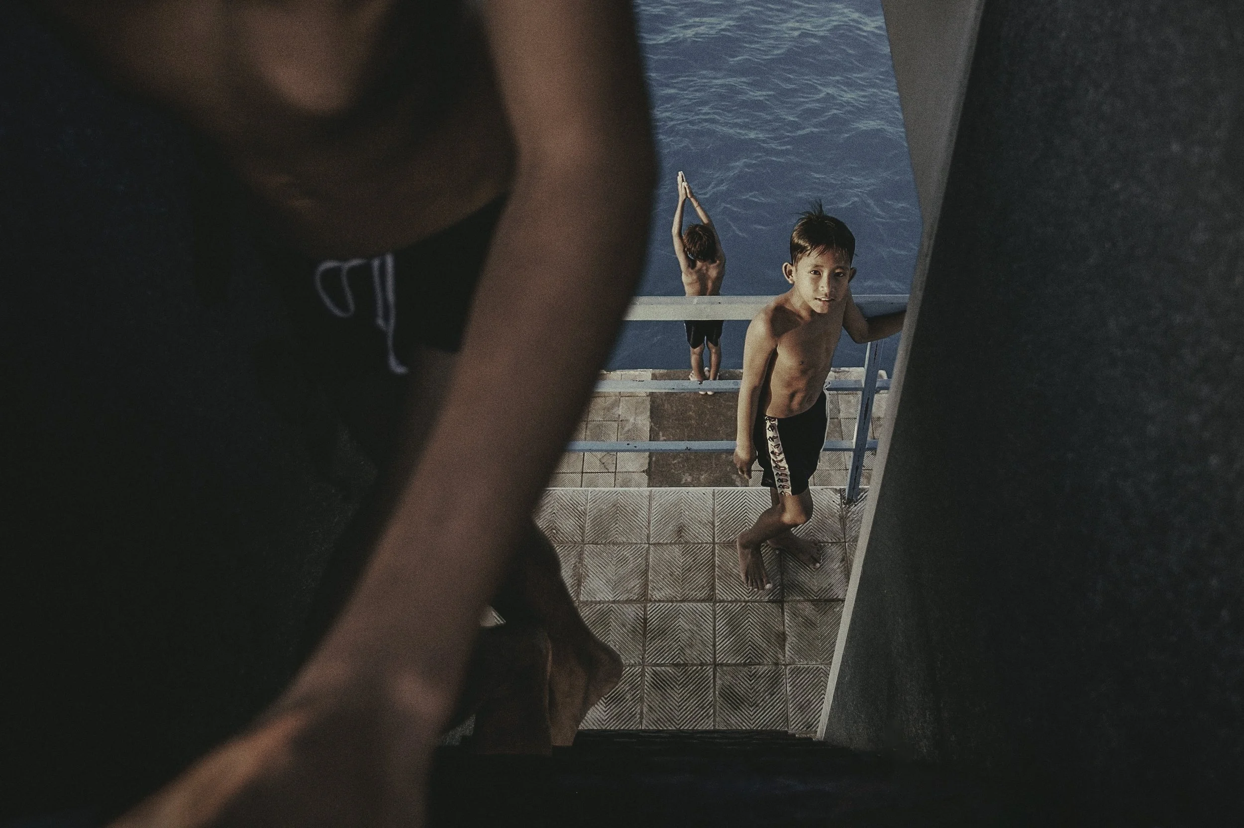 The Ascension - Peering up the ladder leading to the ten meter diving platform at the Olympic Swimming Pool