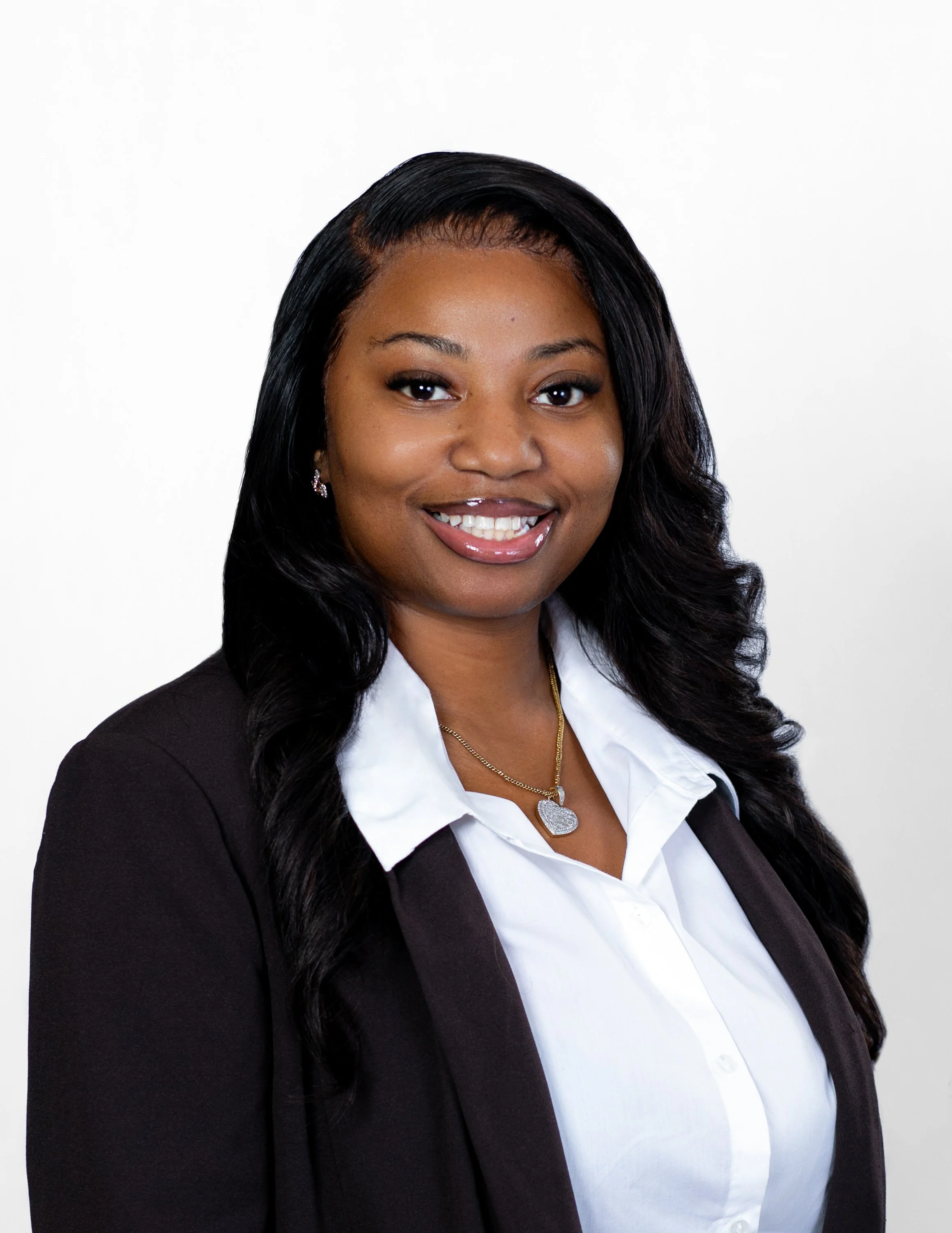 emerging-professionals-network-headshot-black-jacket-white-collar-shirt.jpg