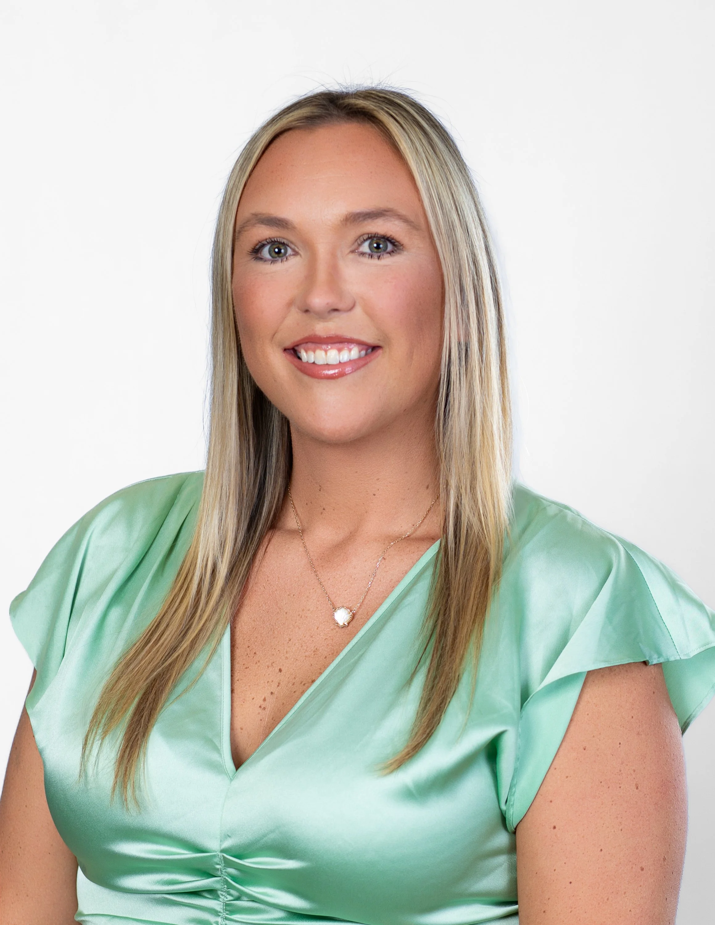 emerging-professionals-network-headshot-light-green-satin-top.jpg