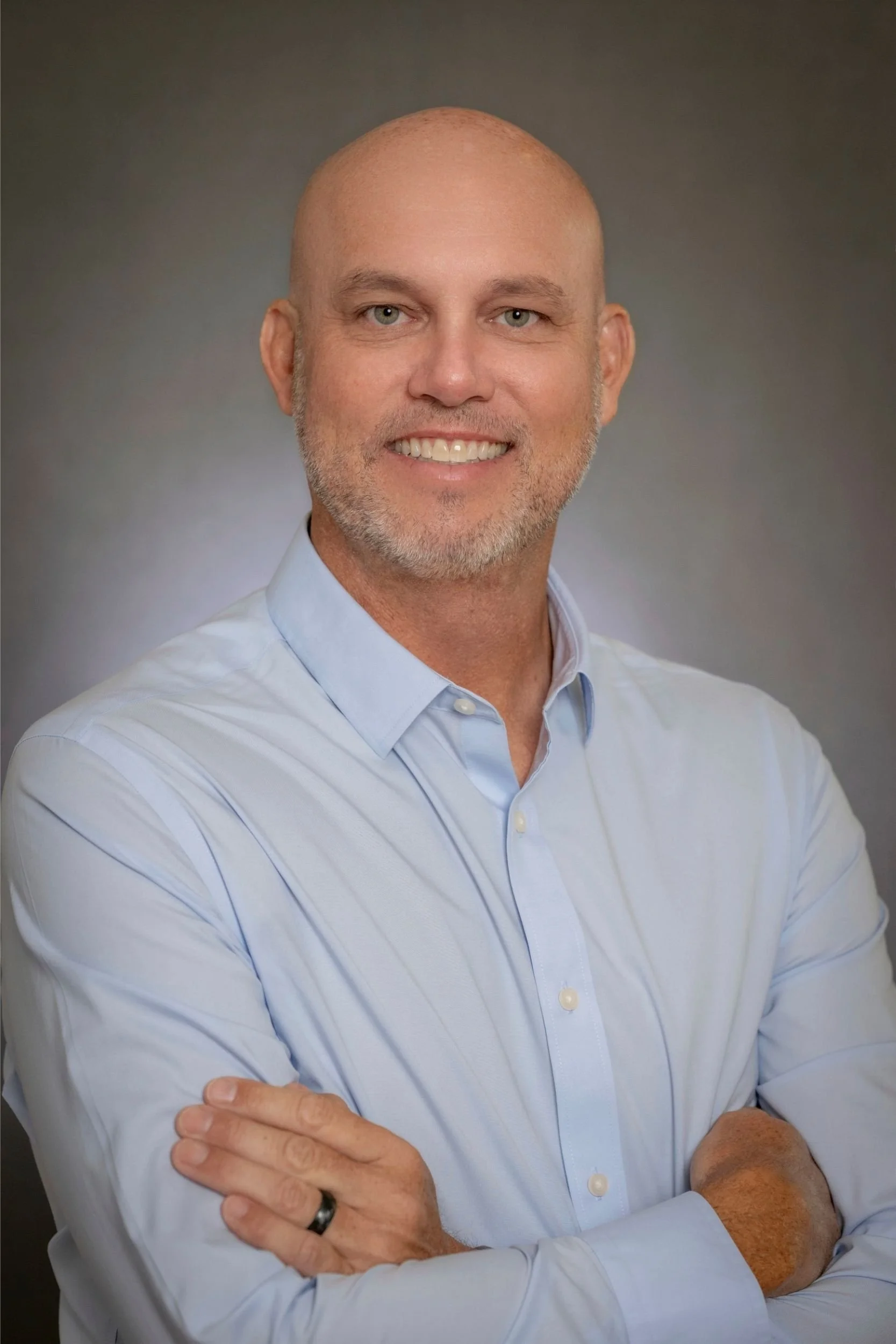 healthcare-conference-headshot-orlando-blue-button-shirt.jpg