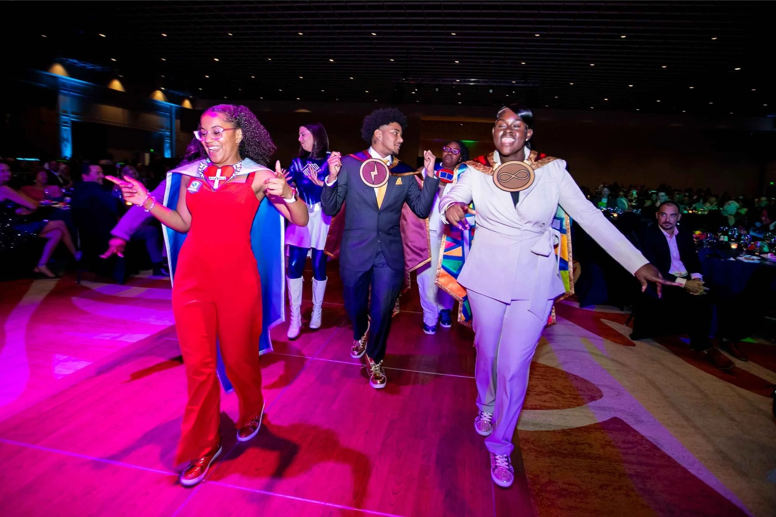Participants walking the runway during the gala presentation