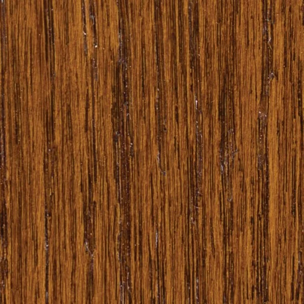 Close-up of a wooden surface with a rich brown color and visible grain patterns.