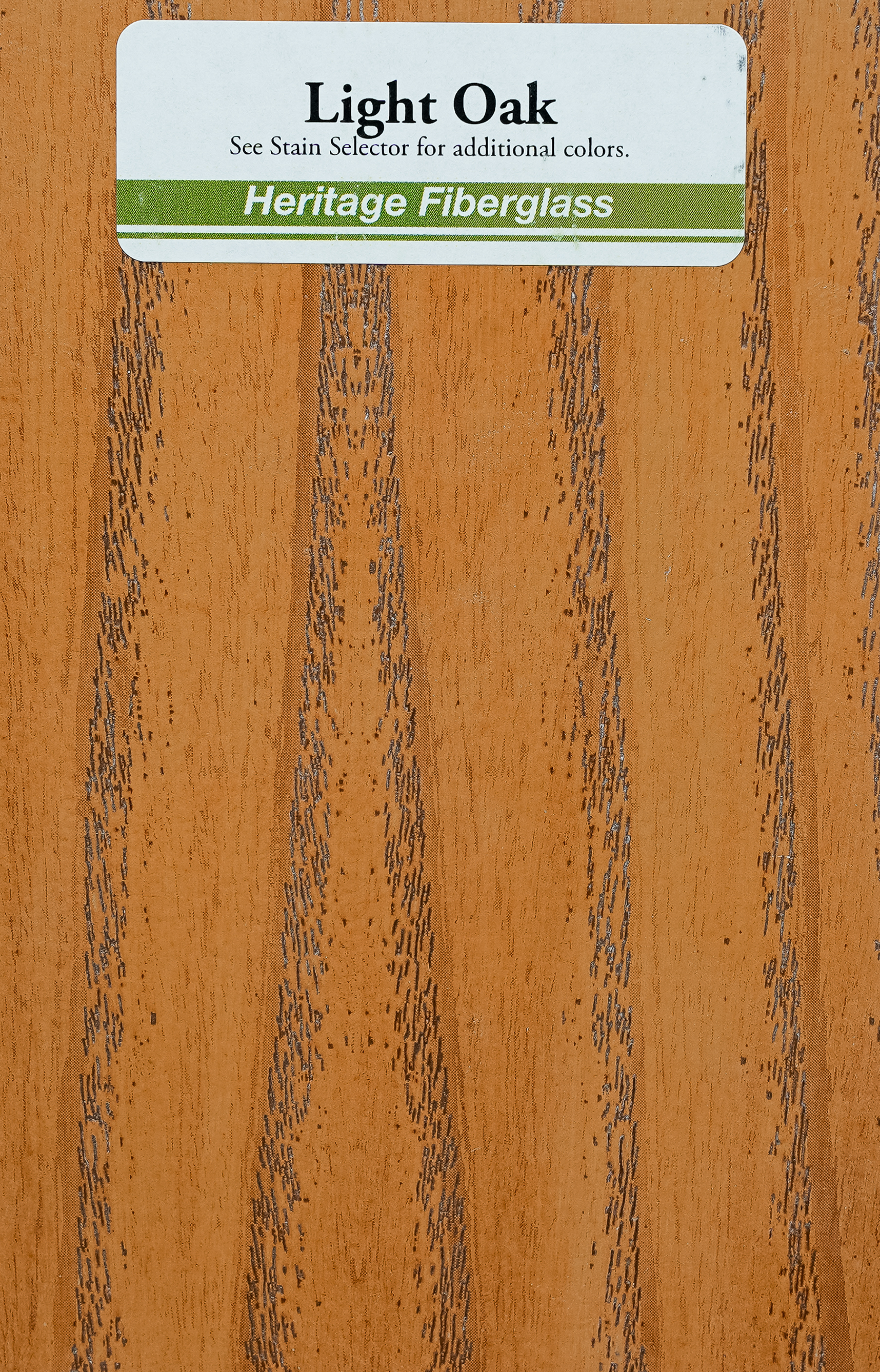 A sample of Light Oak Heritage Fiberglass wood grain laminate.