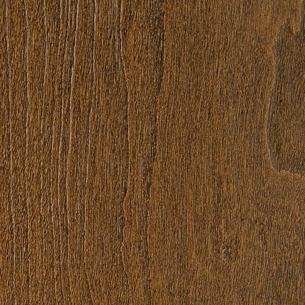 Close-up of a wooden surface with a natural brown finish and visible wood grain pattern.