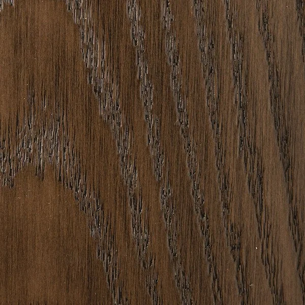 Close-up of a dark wooden surface with visible wood grain patterns.
