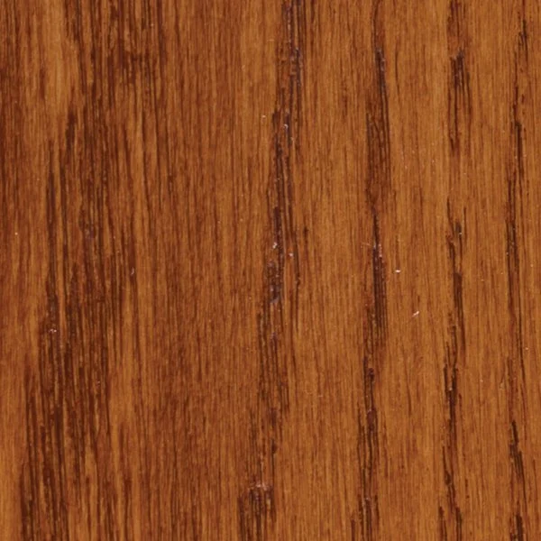Close-up of a wooden surface with a warm brown color and visible wood grain.