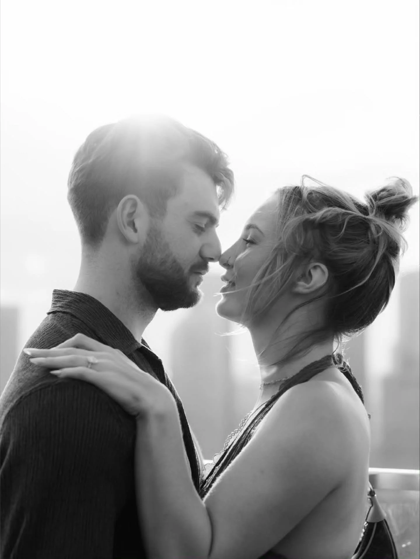 L + N
Proposal at Marina Bay Sands Sky Deck. 
In my most humble opinion, they are hot period. 
Swipe, just swipe and see for yourselves. 
This couple from Canada were made to be models; so I asked about their jobs and man told me he was just a constr