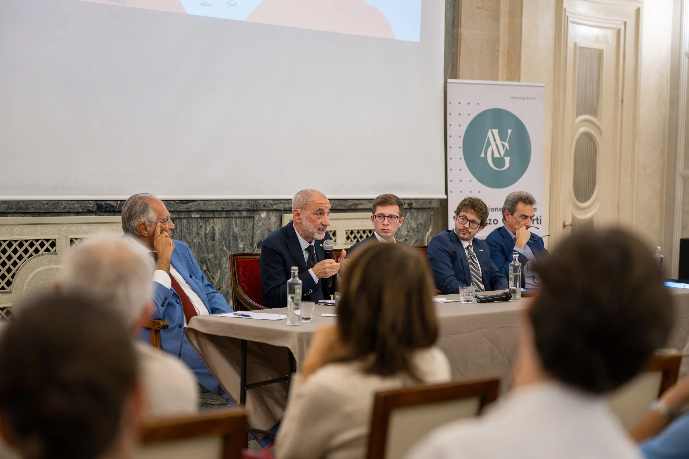 Il tavolo dei relatori al convegno sul fine vita all'Hotel Vittoria di Brescia