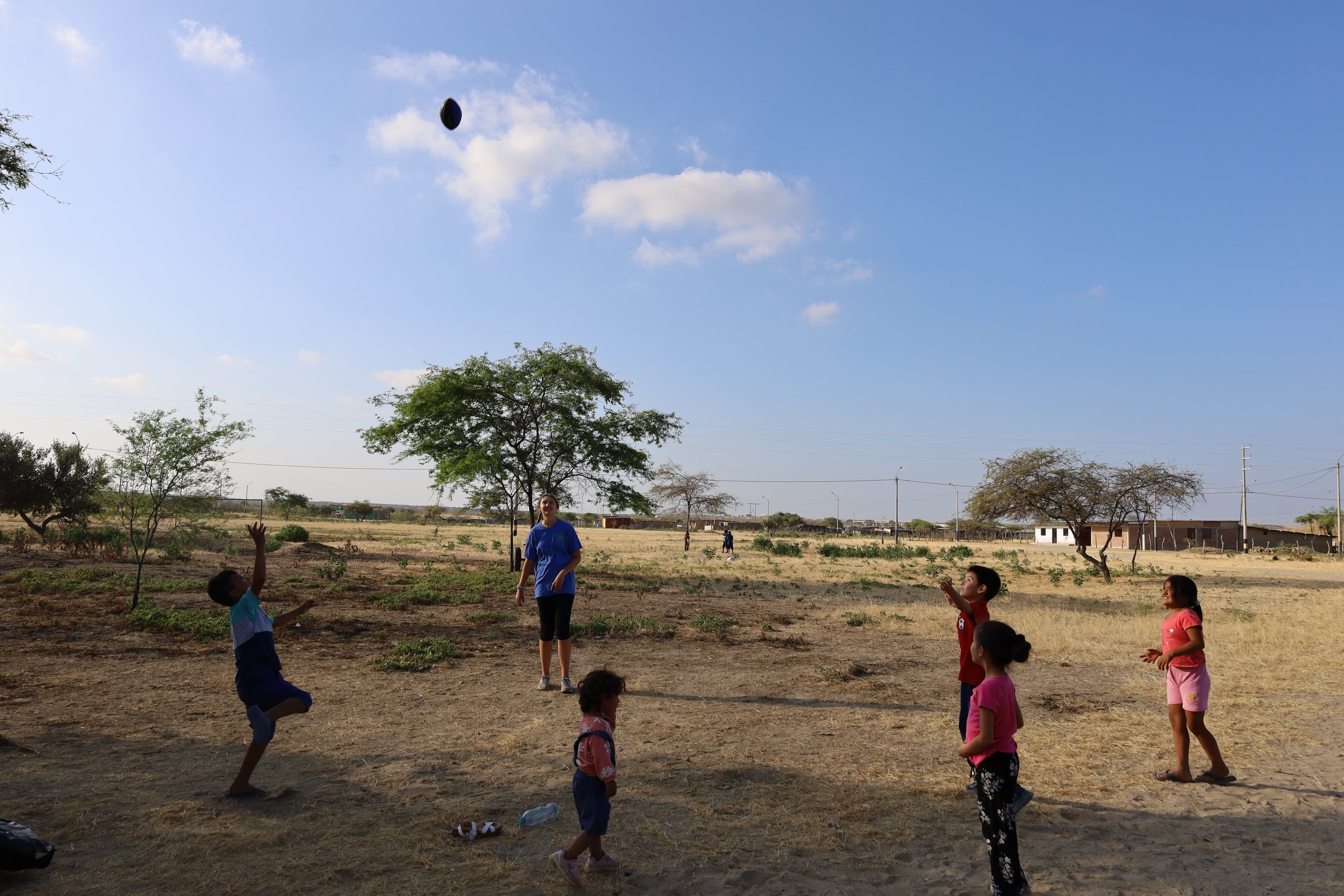 Missionaries teach American Football to Peruvian children.