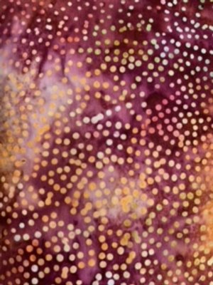 Purple and orange dotted neck wrap.