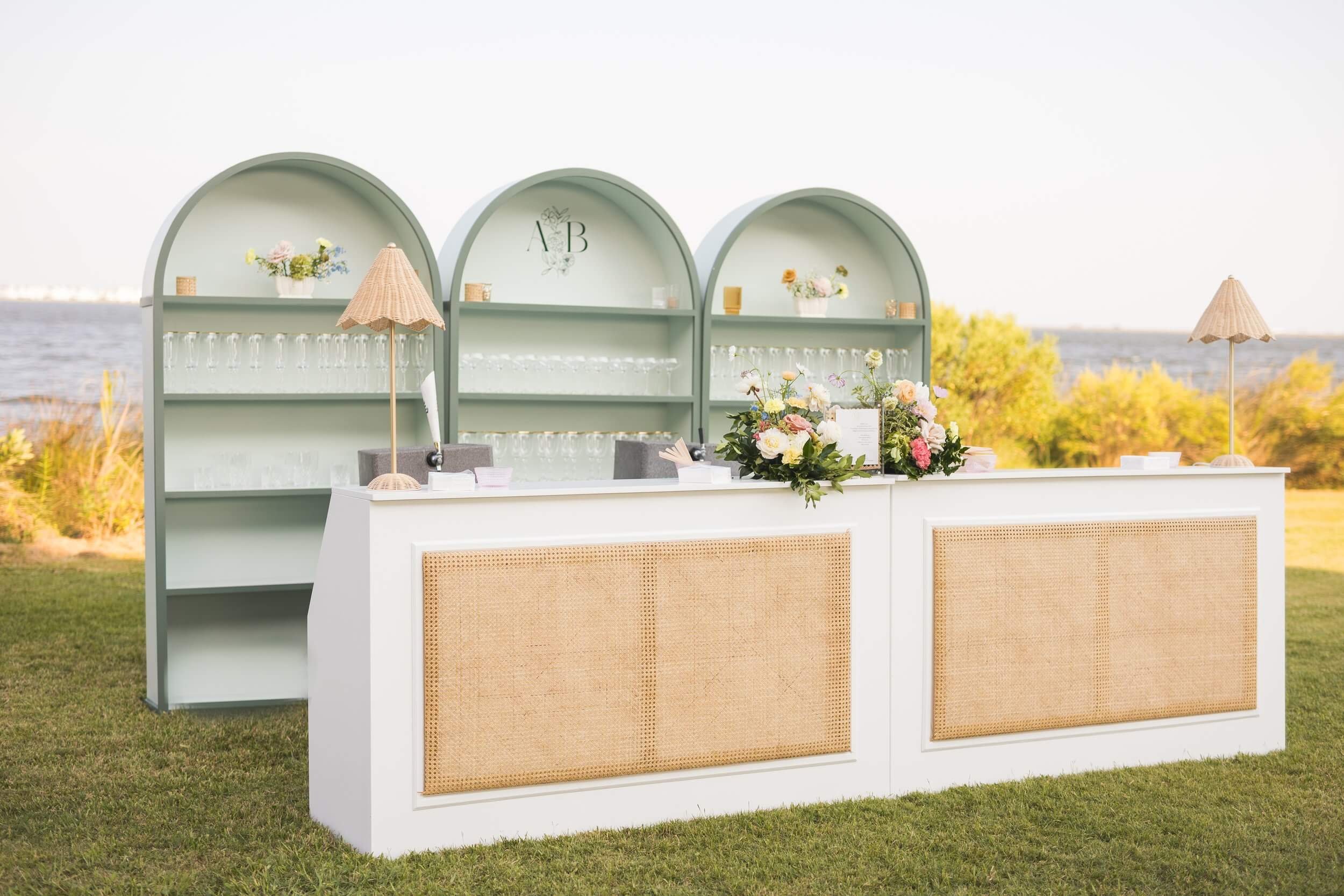  A unique bar set up with arch shelves in front of the sound in the Outer Banks 