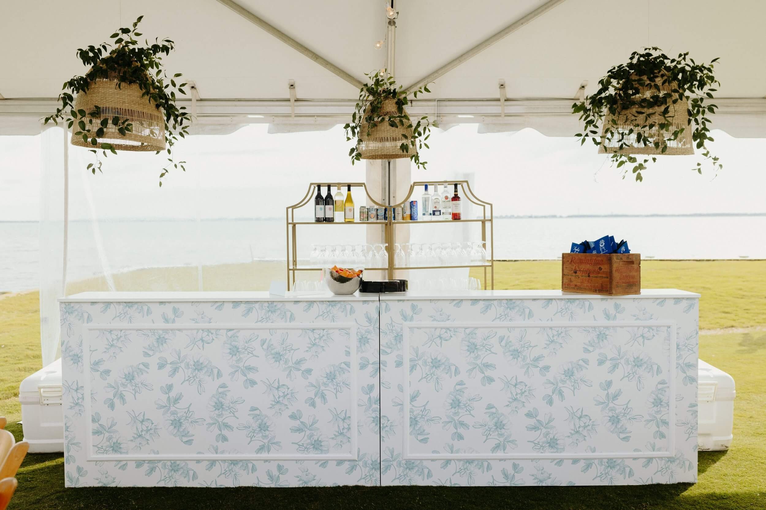  A unique bar rental in a tent at waterfront Outer Banks wedding. 