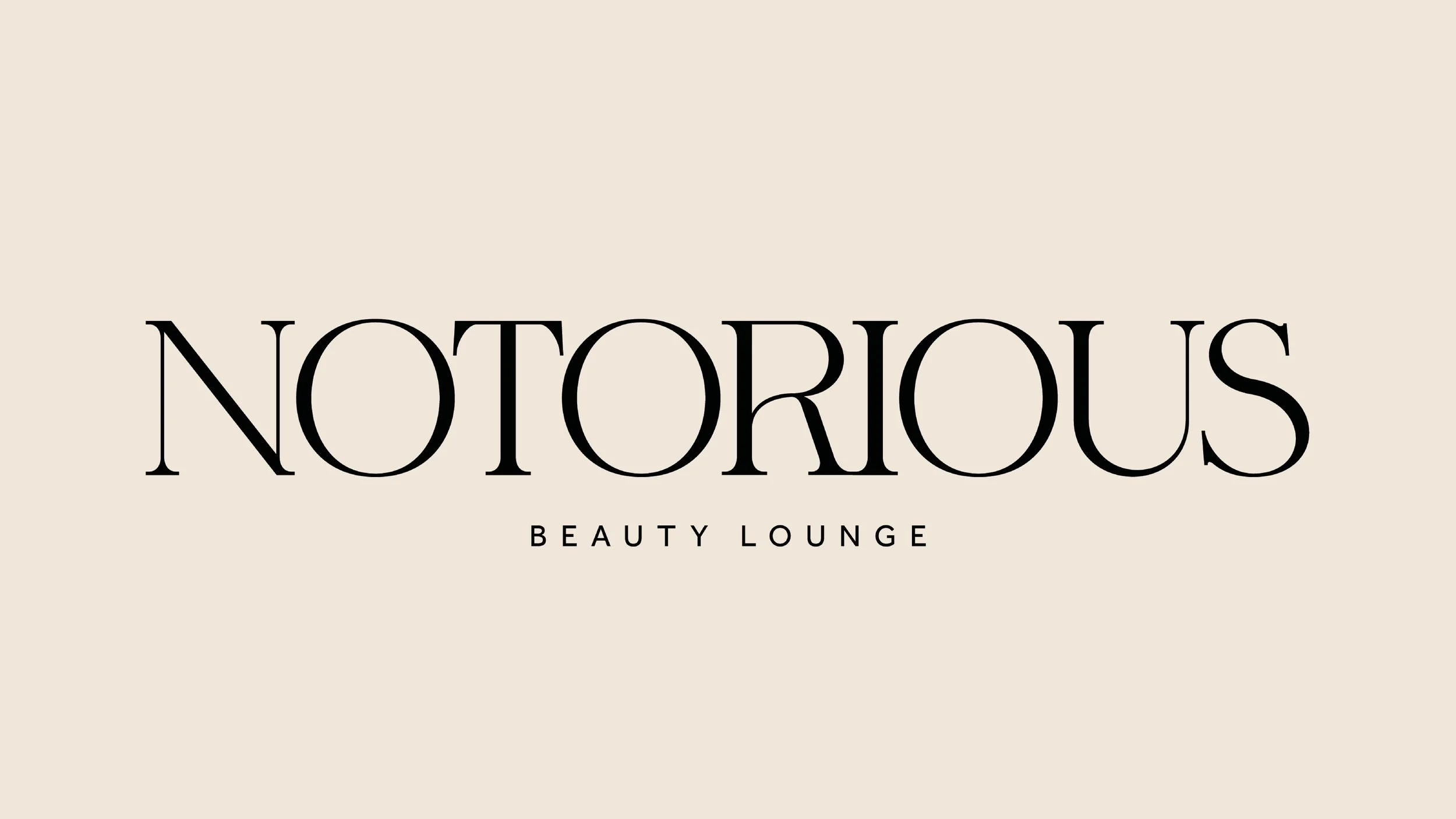 Logo for Notorious Beauty Lounge with beige background and black text.