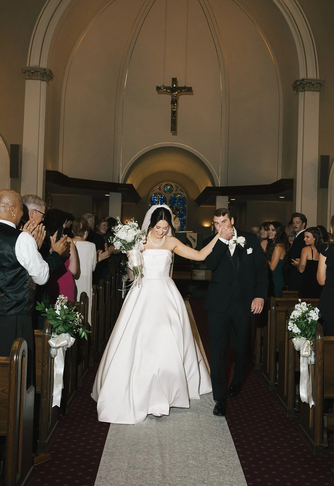 Sweet Kiss in the aisle of church
Abby Hart Photography 