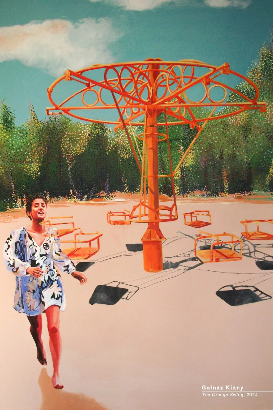 A woman wearing a colorful dress running past an orange swing ride at an amusement park, with trees and a partly cloudy sky in the background.