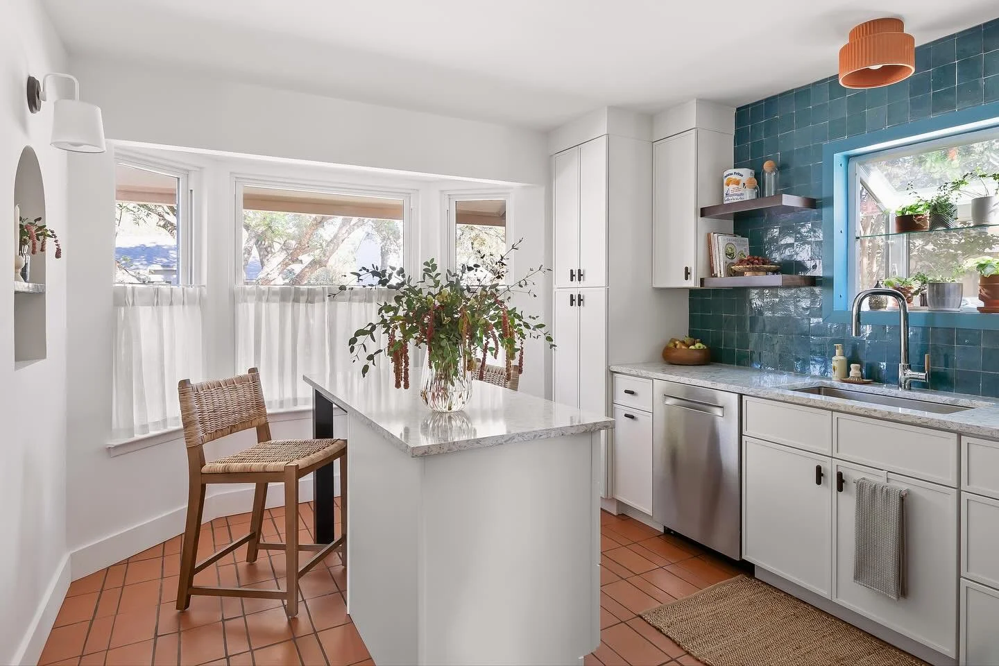 Here it is! The big before + after reveal of my #jgmodmediterranean kitchen. 

Here are the challenges my clients listed before the remodel:

1. Inefficient storage solutions
2. Low ceilings
3. Bay window feels awkward
4. Minimal counter space
5. &ld