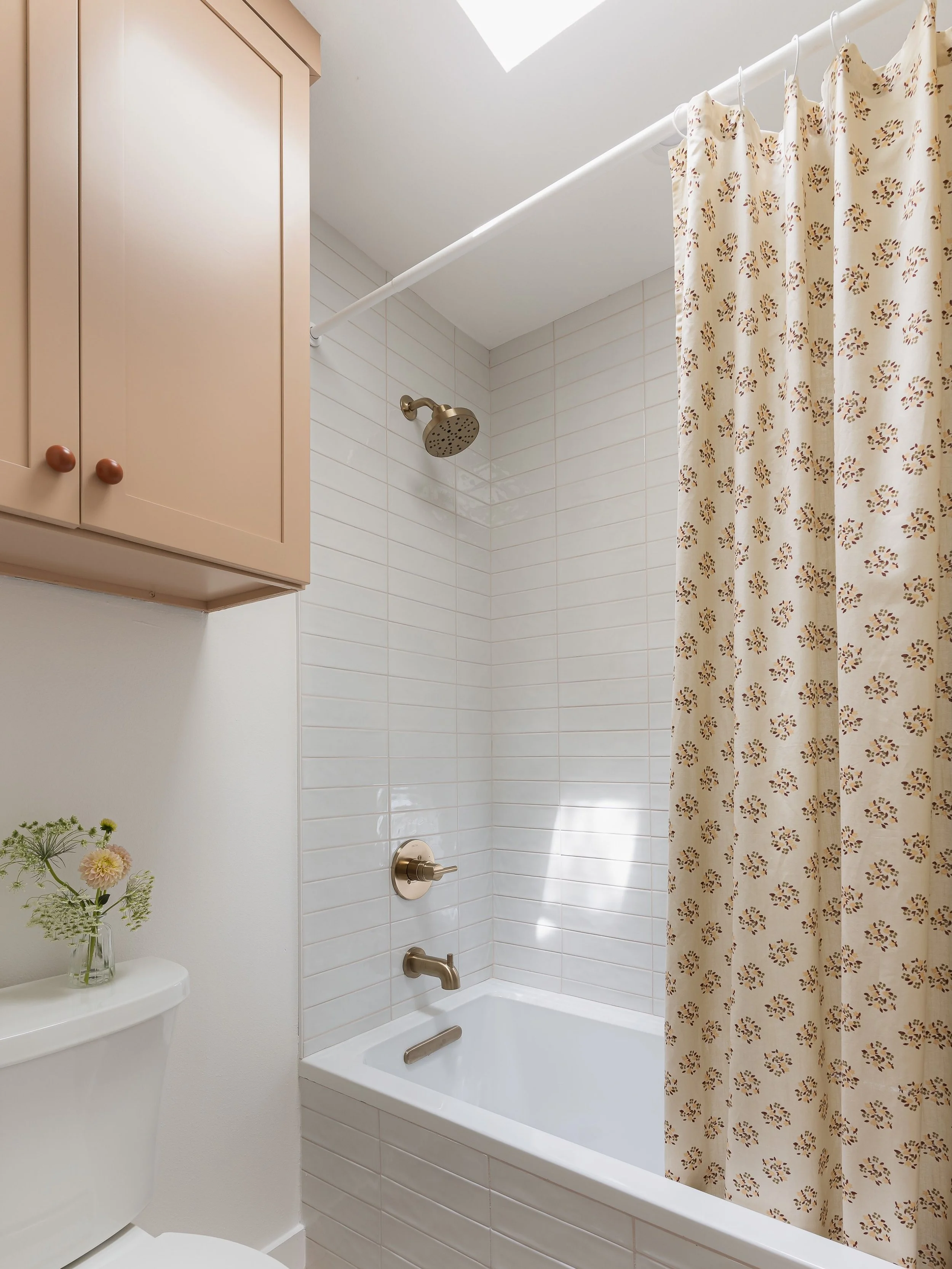 My client originally wanted to leave this bathroom alone. It&rsquo;s a kids bathroom and it worked just fine.

Once we started the design process, I suggested giving it a light refresh. Why? Every other space in the house was getting an update. The m