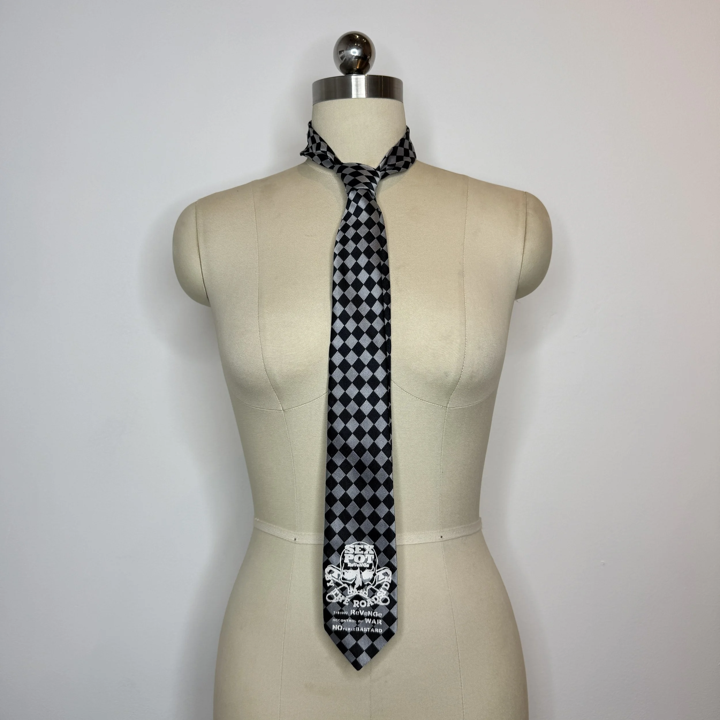 sexpotrevengecheckeredtie1.jpg