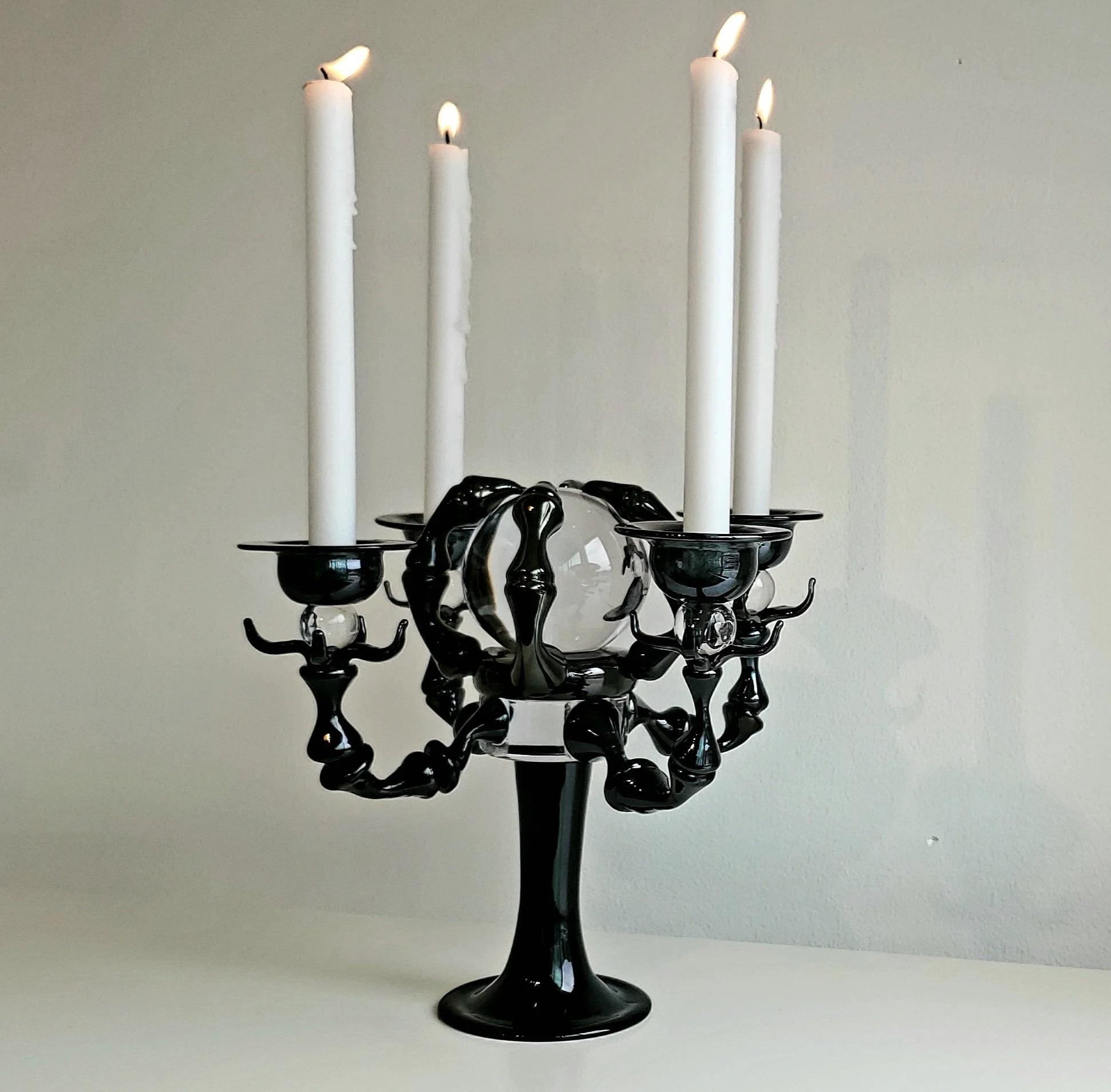 Five Magics, 2021 hot sculpted and blown glass. 5 crystal balls featuring a demon claw center piece 