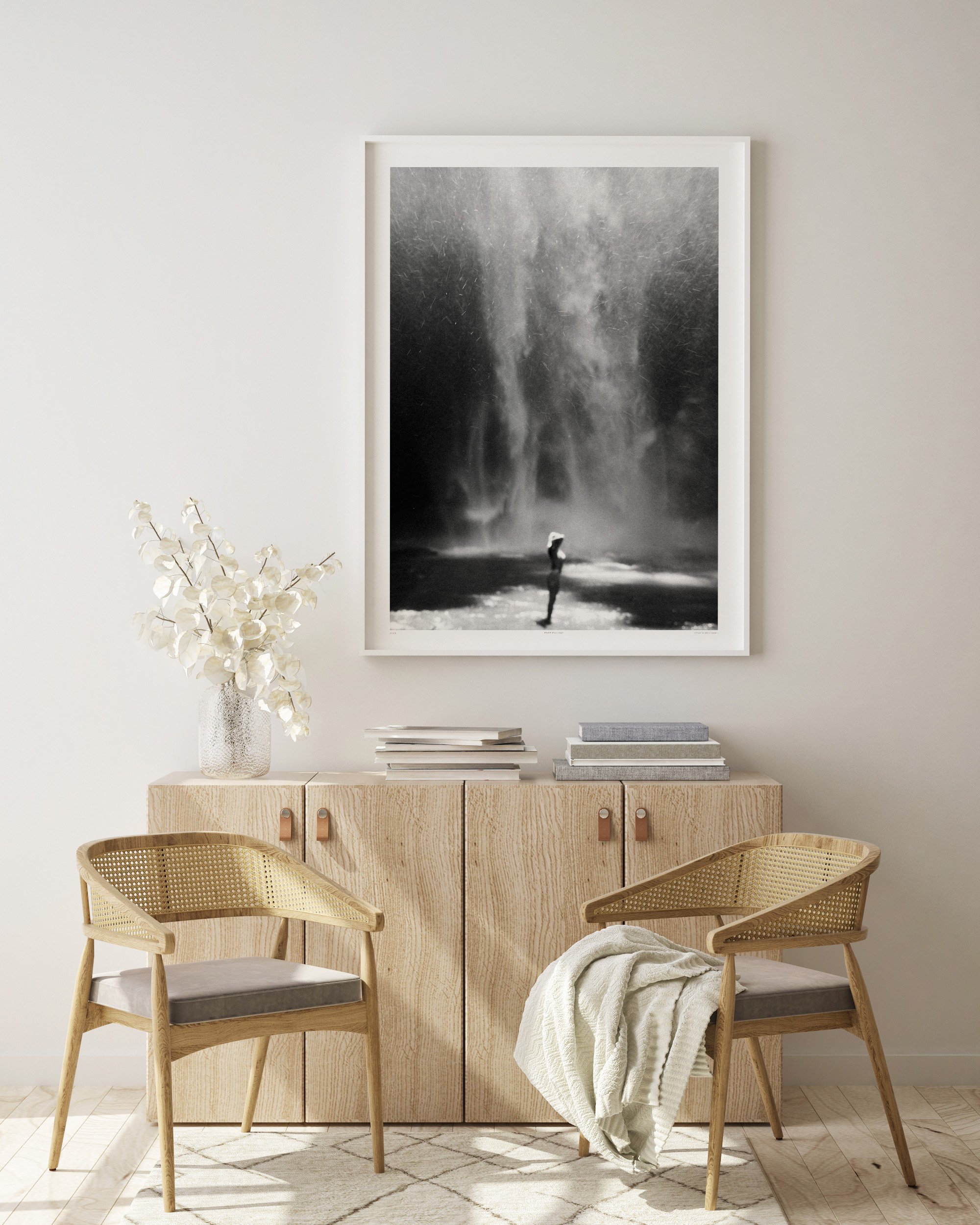 Print artwork in black and white of a woman under a waterfall in Ubud, Bali. Available framed or unframed in 50x70cm and 70x100cm, supporting 1% for the Planet