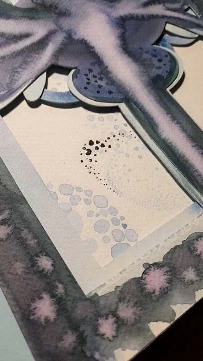 Silver details of the purple flower totem