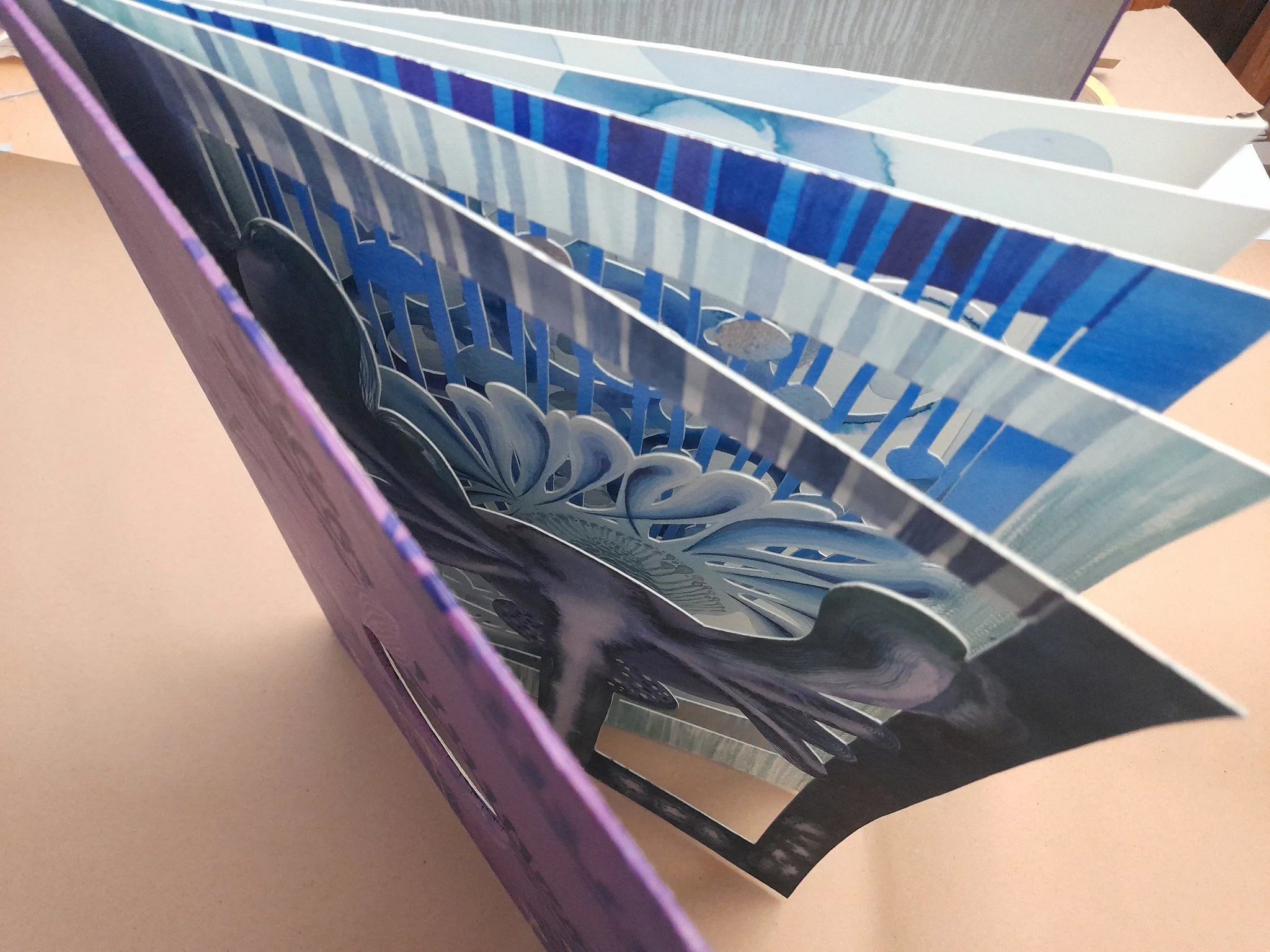 Strata purple painting book above