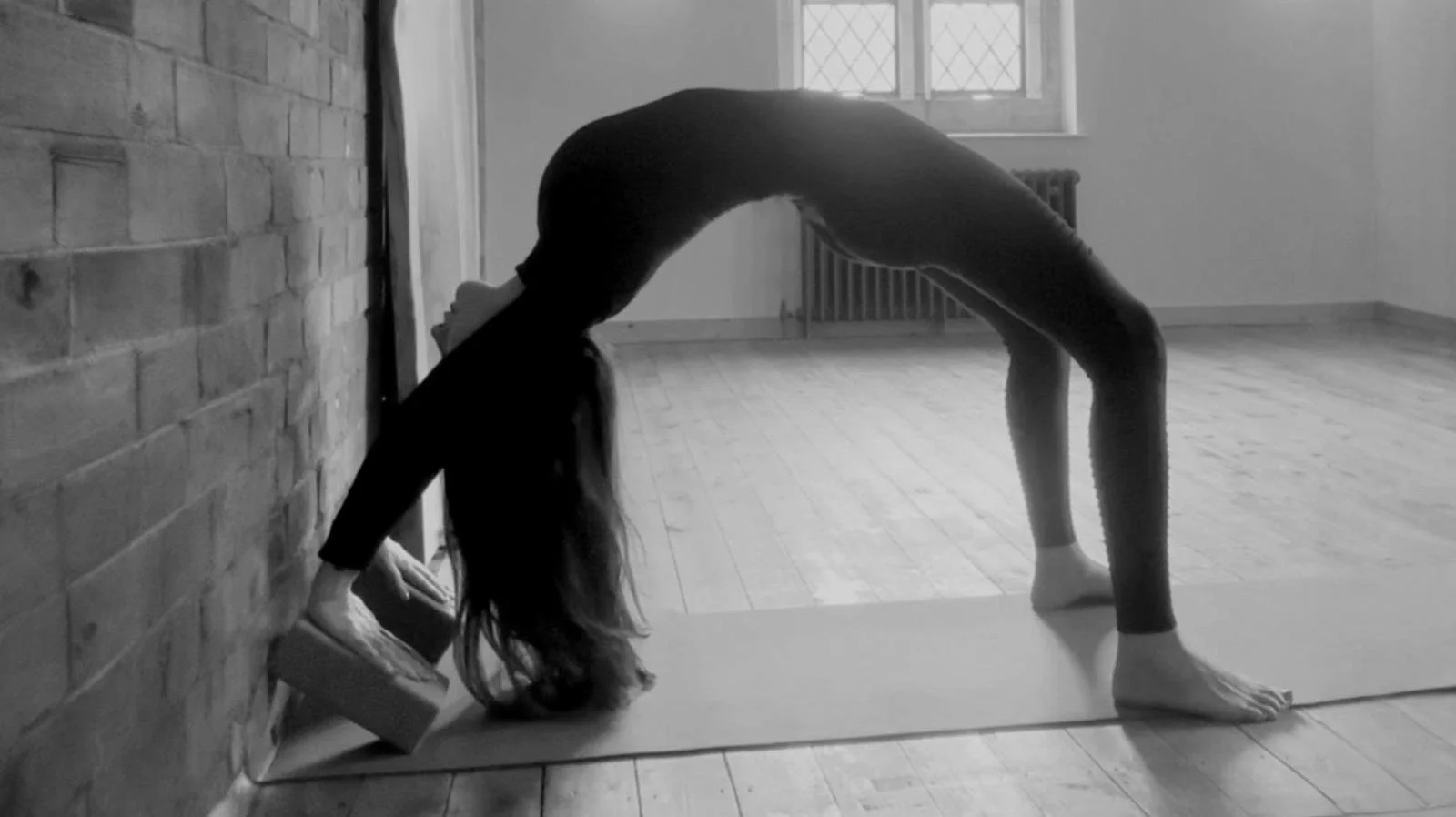 Heart Open, Spine Long: Unlock the Power and Grace of Your Backbend with Rachel Roy.