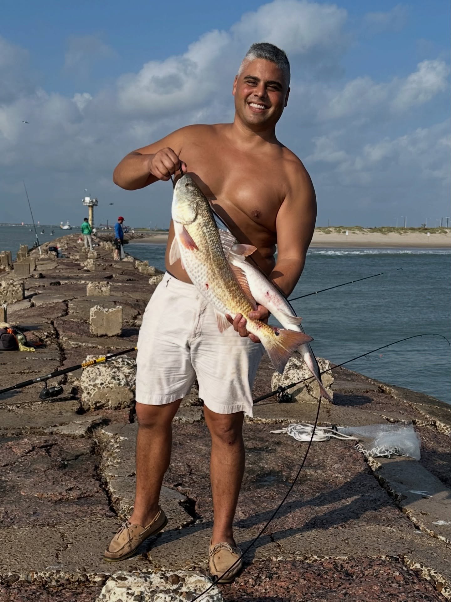 This is how we do winter in South Texas! Safe to say the boys are hooked. God&rsquo;s creation continues to provide right from the rocks of the Laguna Madre. #kunkleforcongress #tx34 #lagunamadre #southtexas  #redfish