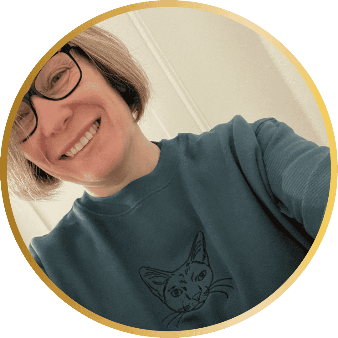 Close upof lady with glasses smiling at camera