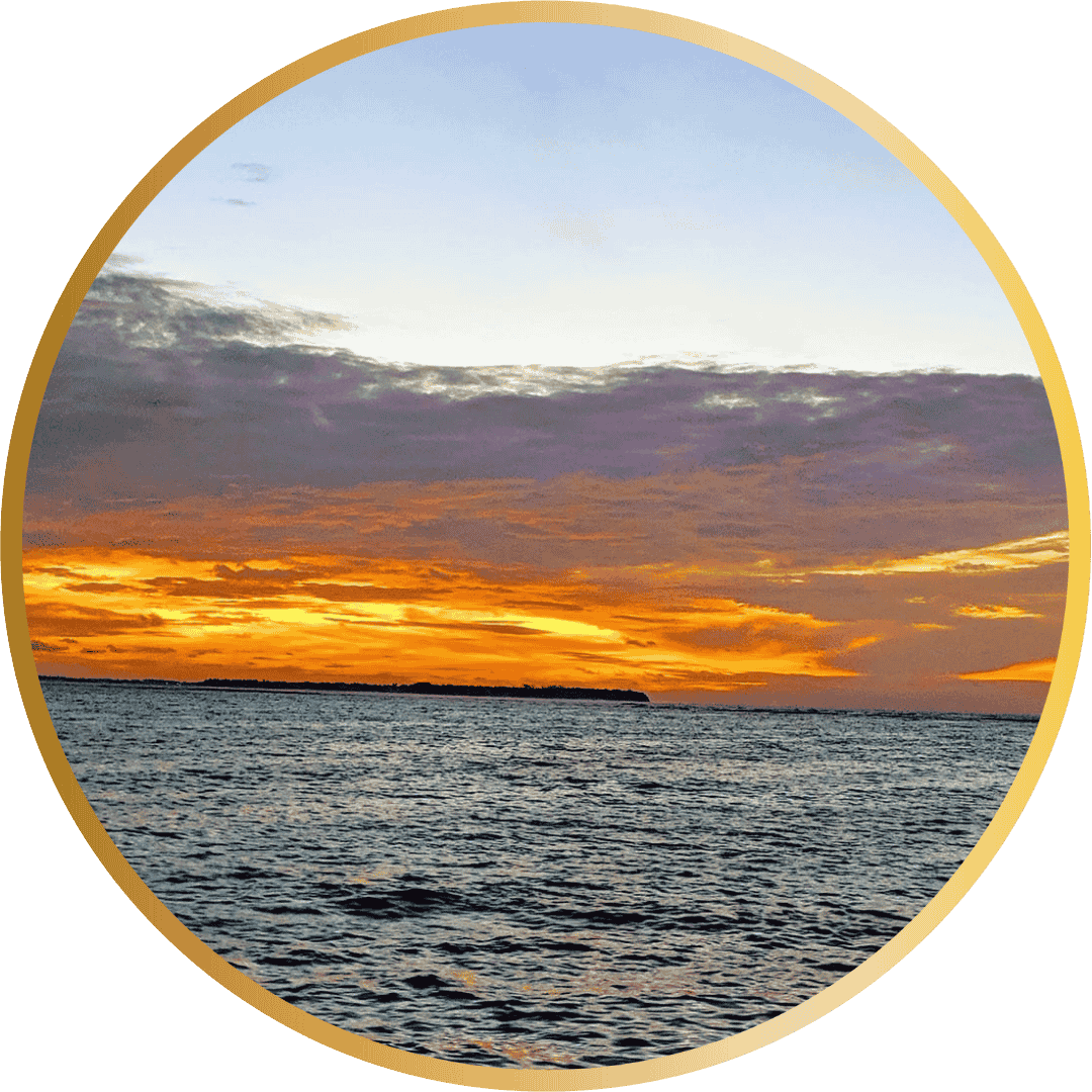 A picture of a sunrise over the sea taken in the Maldives