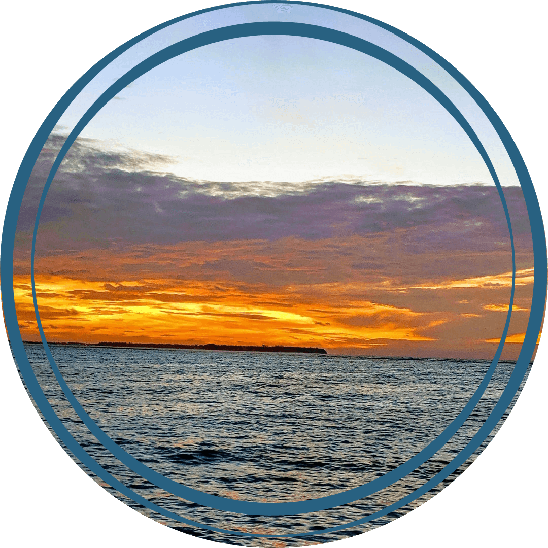 A picture of a sunrise over the sea taken in the Maldives