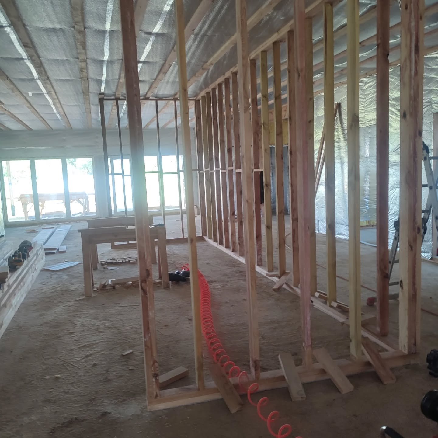 Interior framing and insulation is nearly complete at Blossom Cottage. We're awaiting an estimate from the power company about finally extending electricity to our site. 

Can you see yourself hanging sheetrock and laying tiles here later this summer