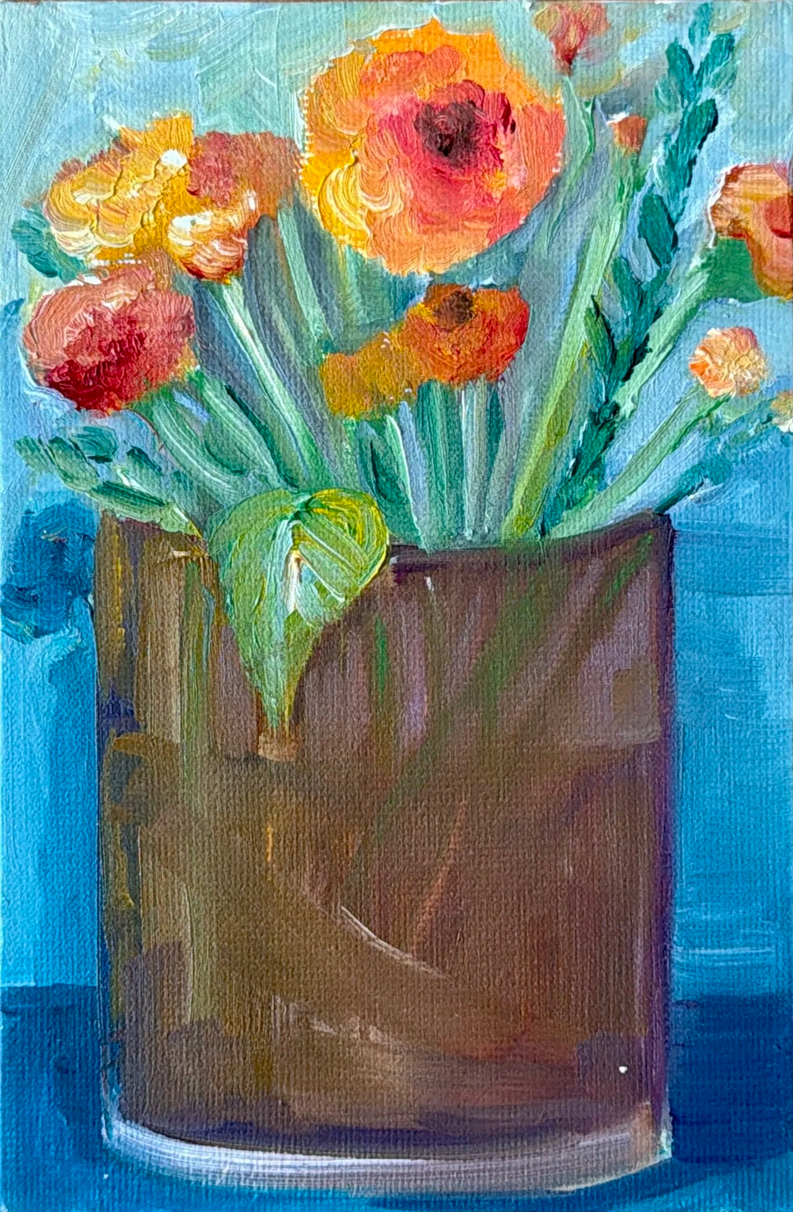 45. Orange Flowers in Glass Vase