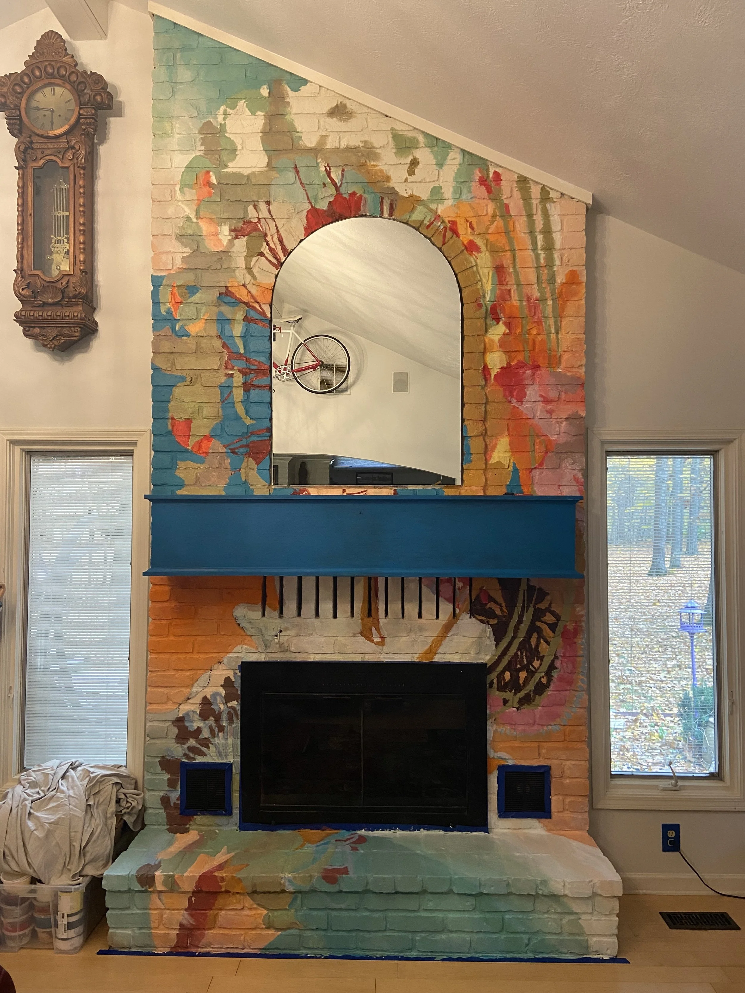 Fireplace Mural Mirror Installation in Noblesville, Indiana in progress.jpg