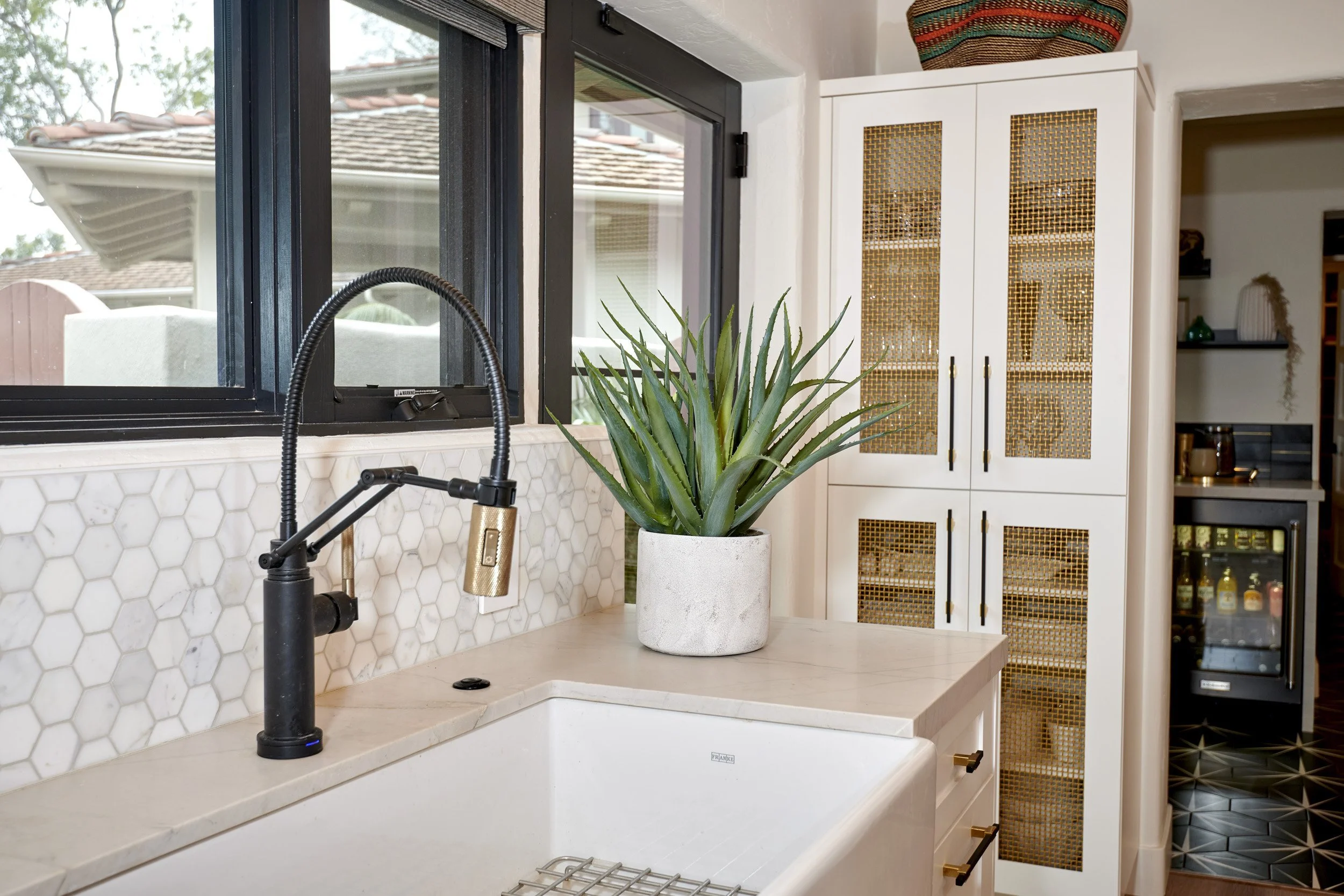  Custom Metal detailing in the kitchen cabinets. 