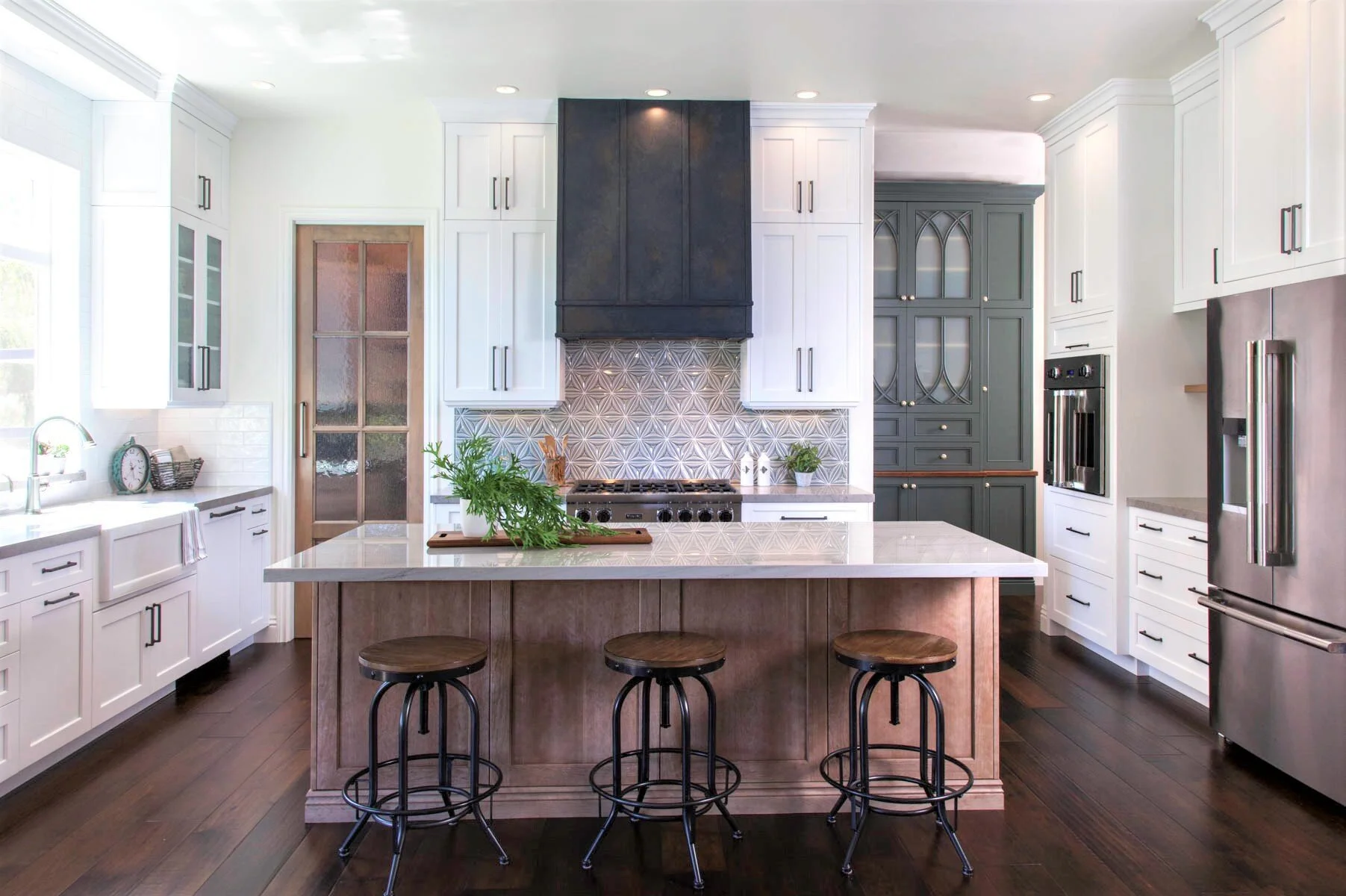 5. Classic farmhouse kitchen layered in texture and color.