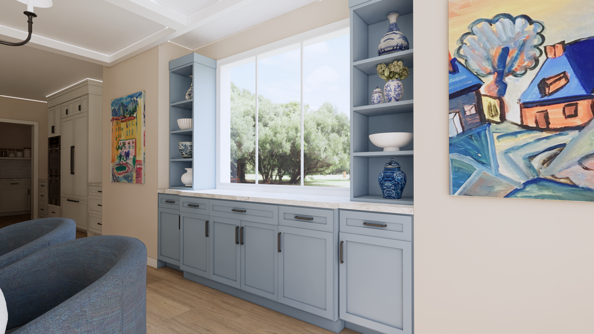 A bright and cozy kitchen corner featuring two light blue open shelves with decorative blue and white vases, a window showing greenery outside, and colorful abstract paintings on the wall.