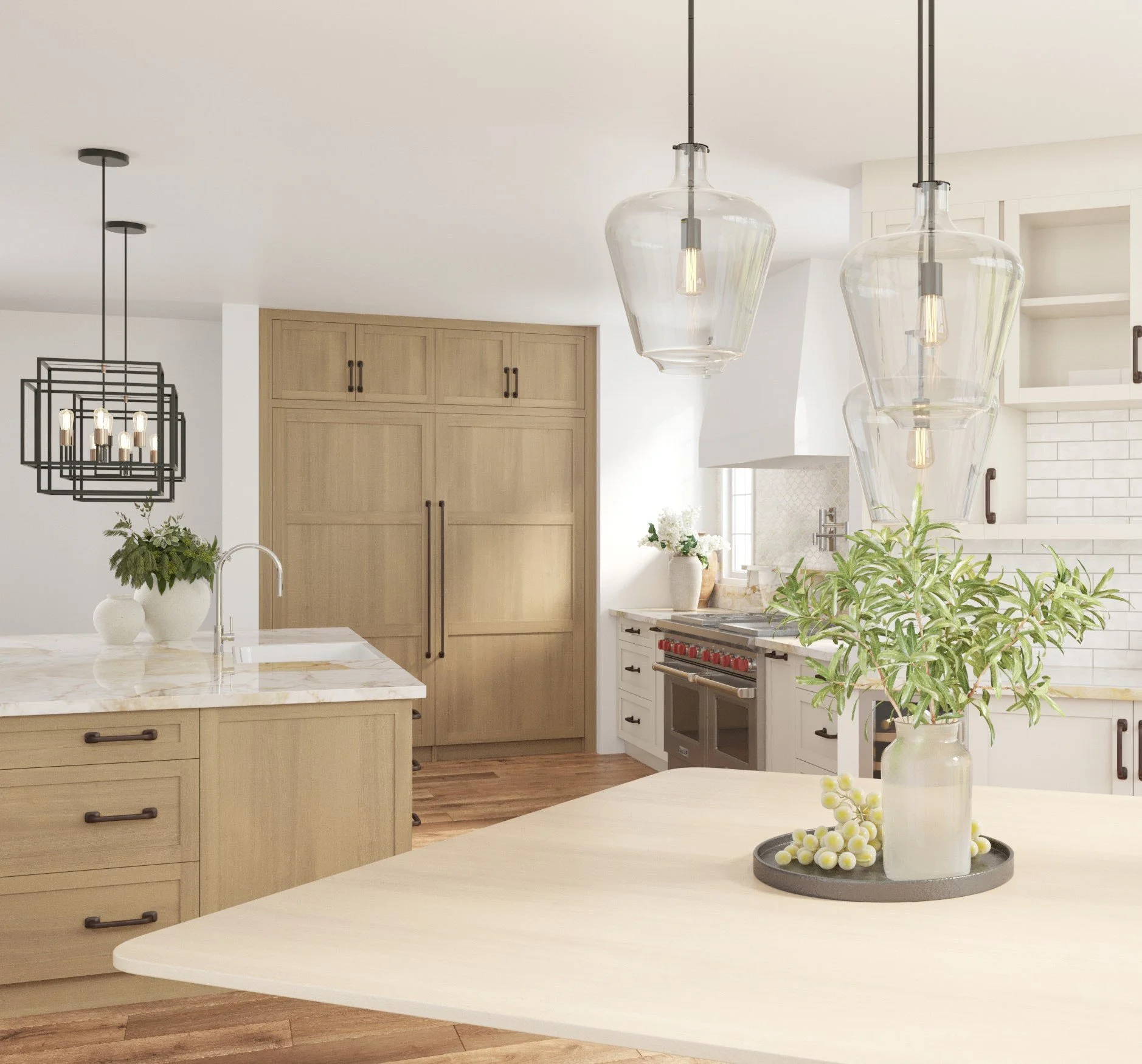 Modern kitchen with light wood cabinets, a marble countertop, green plant in a vase, pendant lights, and a tray with white berries on the island.