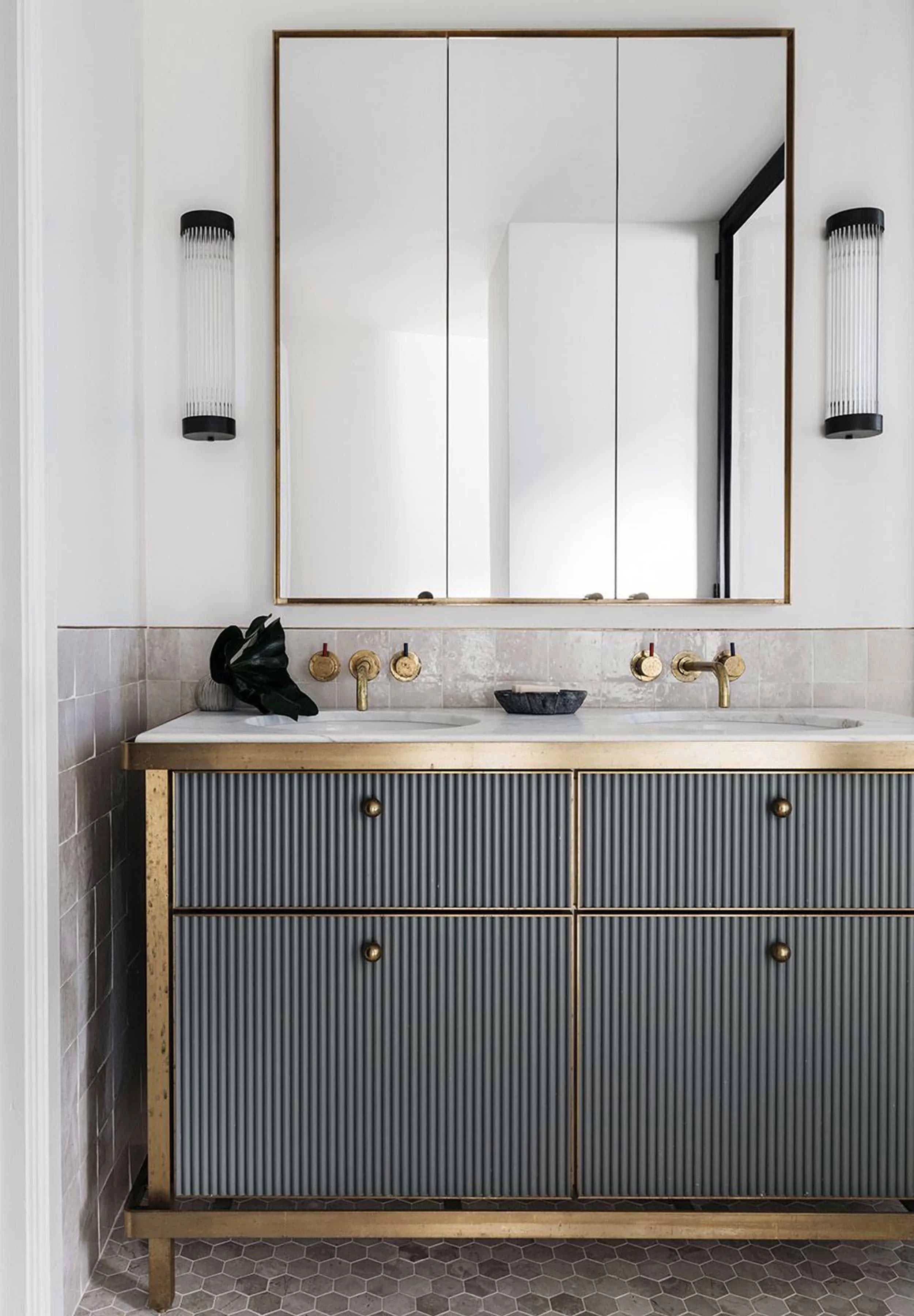  The bathroom is  stunning work of art and the medicine cabinet is a simple and functional item.    image via  house beautiful  | design by  aren’t & pyke  