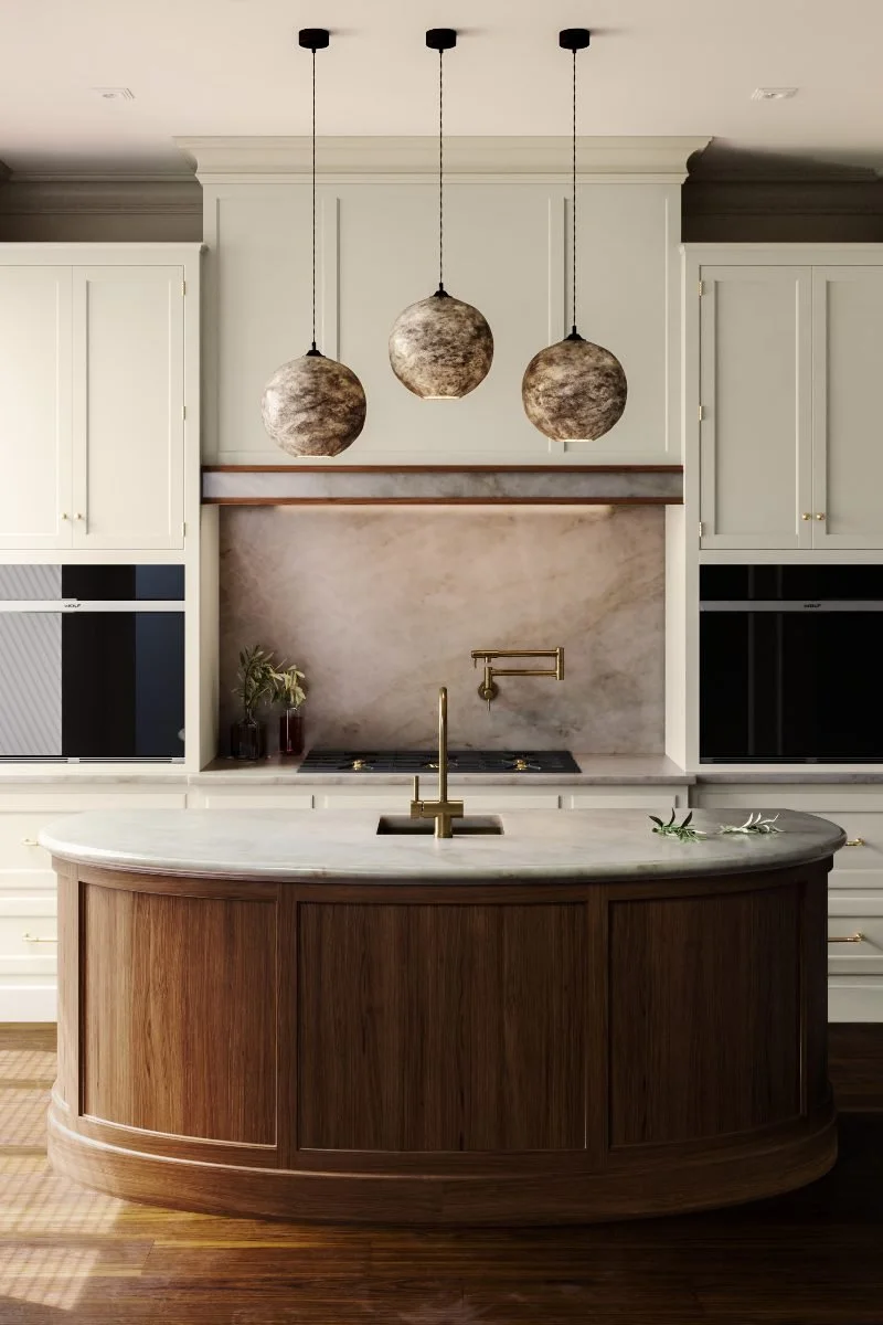 This timeless curved kitchen island with oak panelling by Hetherington Newman oozes charm and sop histication.