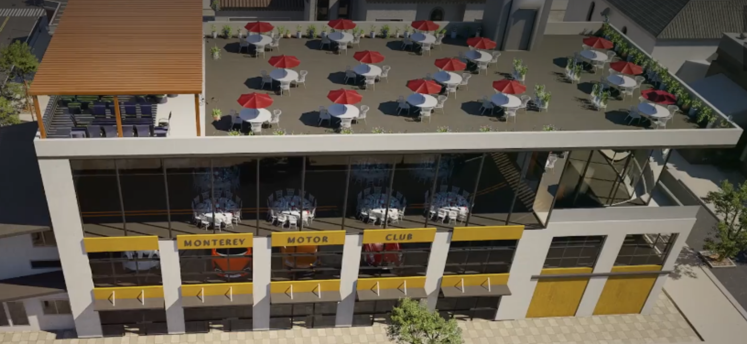 Aerial view of a rooftop restaurant with outdoor seating and red umbrellas, parking garage below, and a sign reading 'Monterey Motor Club' on the building.