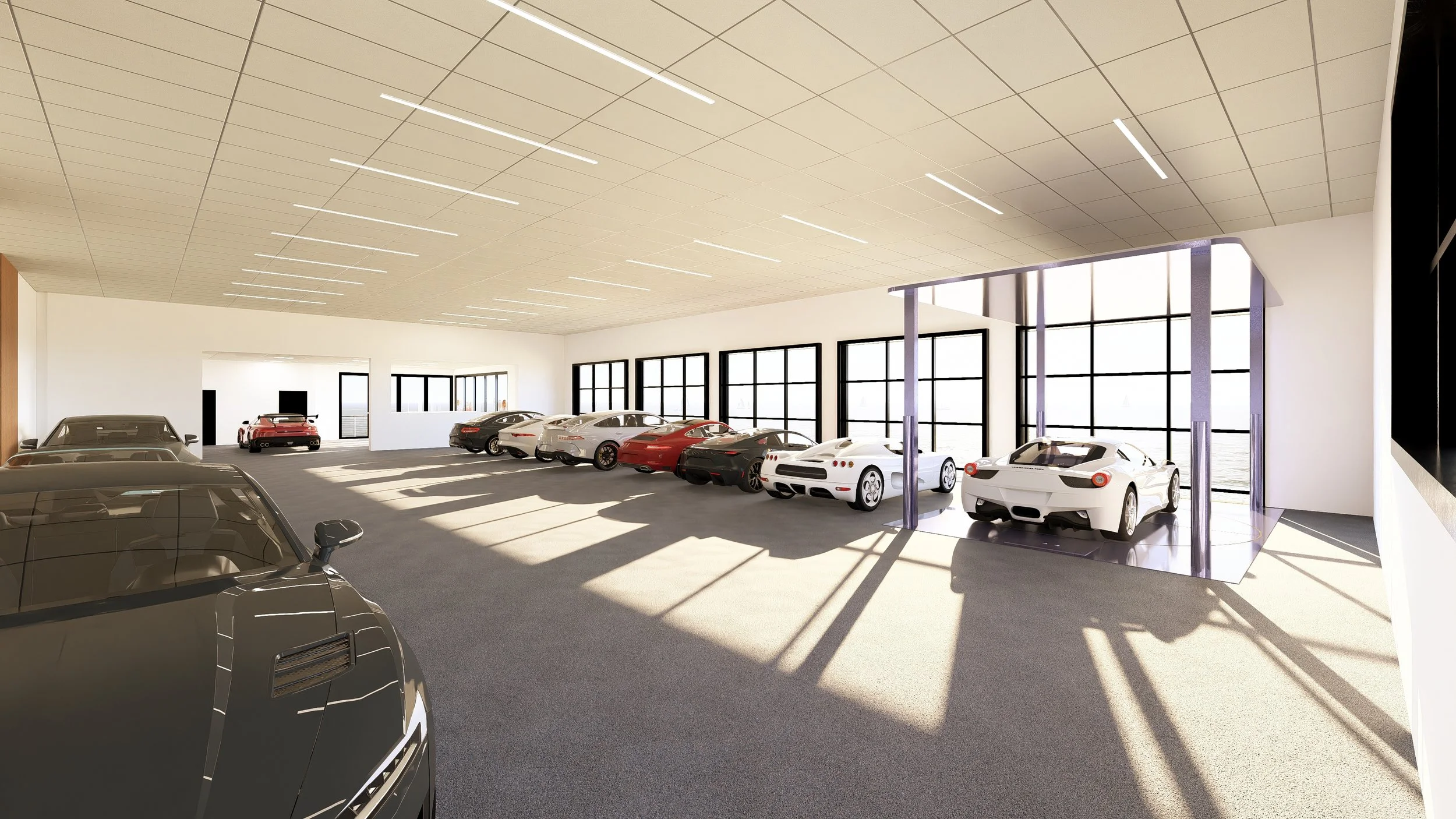 A modern indoor car showroom with several luxury sports cars parked inside, large windows let in natural light, and a cityscape view is visible through the windows.
