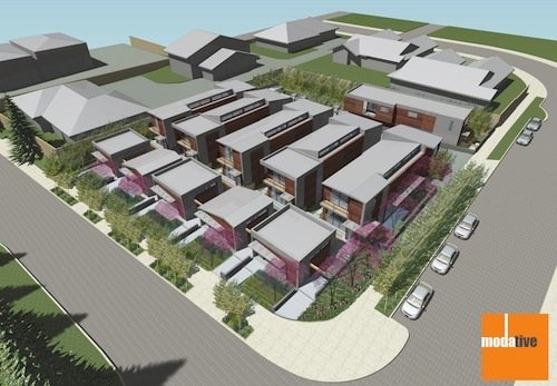 A bird's eye view rendering of a modern residential complex with multiple townhouses, landscaped gardens, and parking on the street.