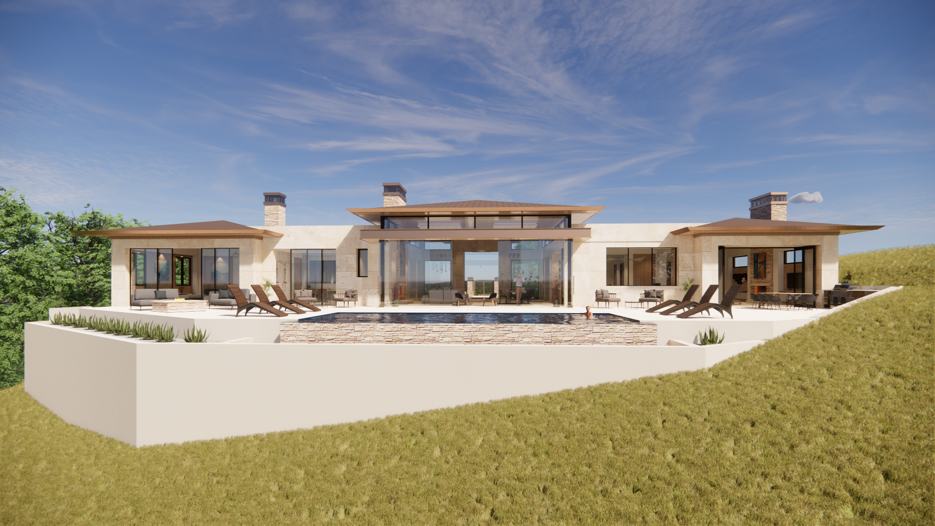 Modern house with large glass windows, surrounded by a landscaped grassy yard with a flat white wall and various outdoor seating and lounge chairs, under a blue sky with some clouds.