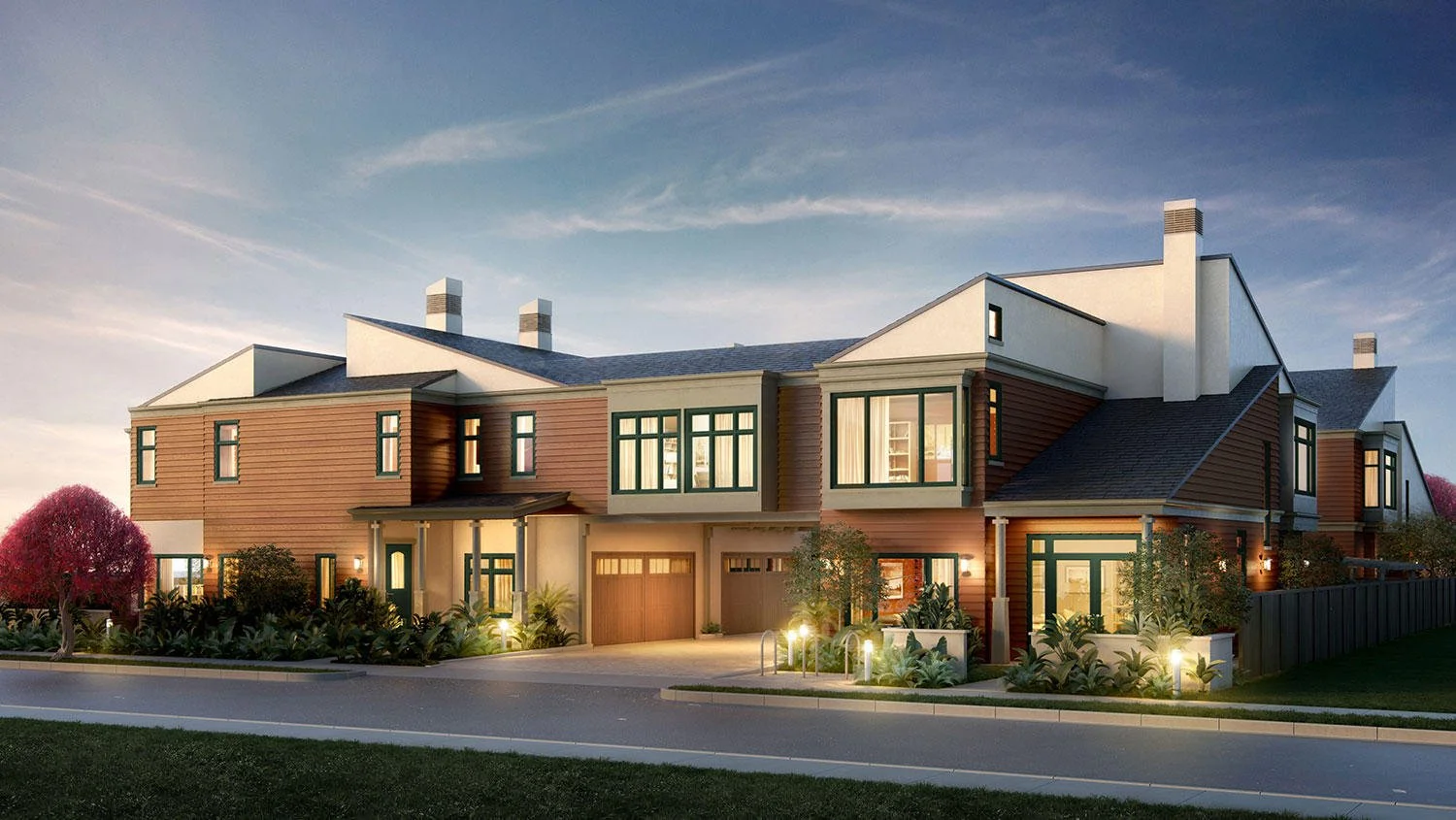 A modern multi-story house with a combination of white and wooden exterior, multiple large windows, garage doors, and landscape lighting at dusk.