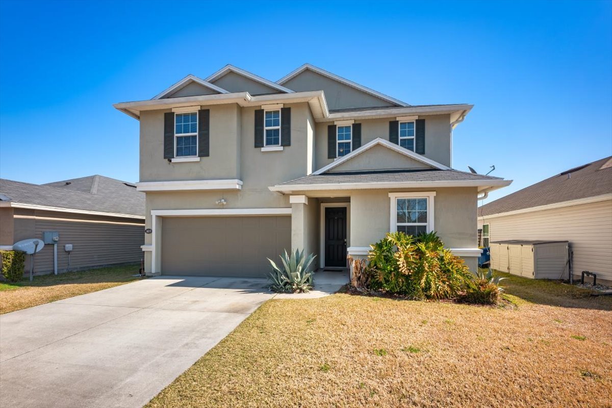 16019 Hutton Ln 2 story home on pond.jpg