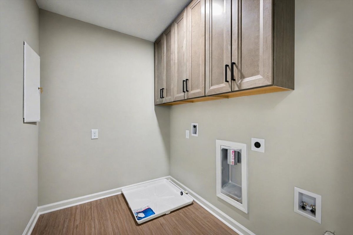 1324 River Ct laundry room with cabinets.jpg