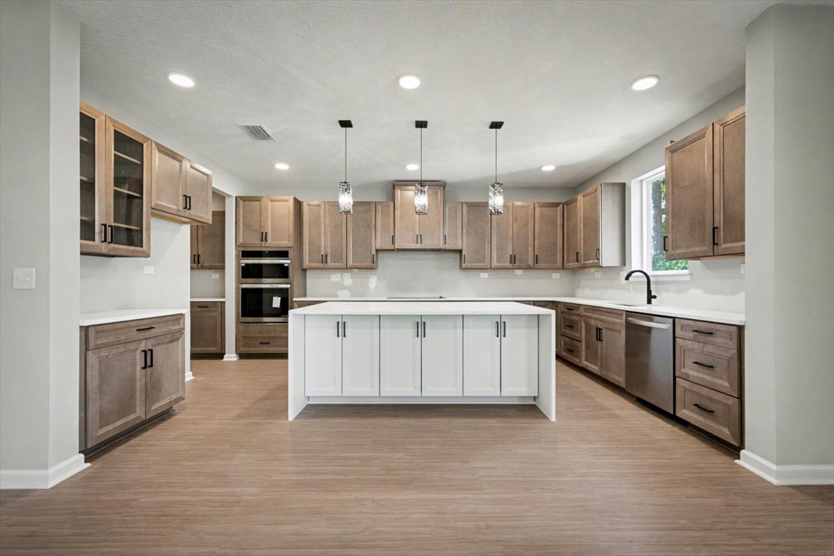 1324 River Ct oversized kitchen with waterfall island.jpg