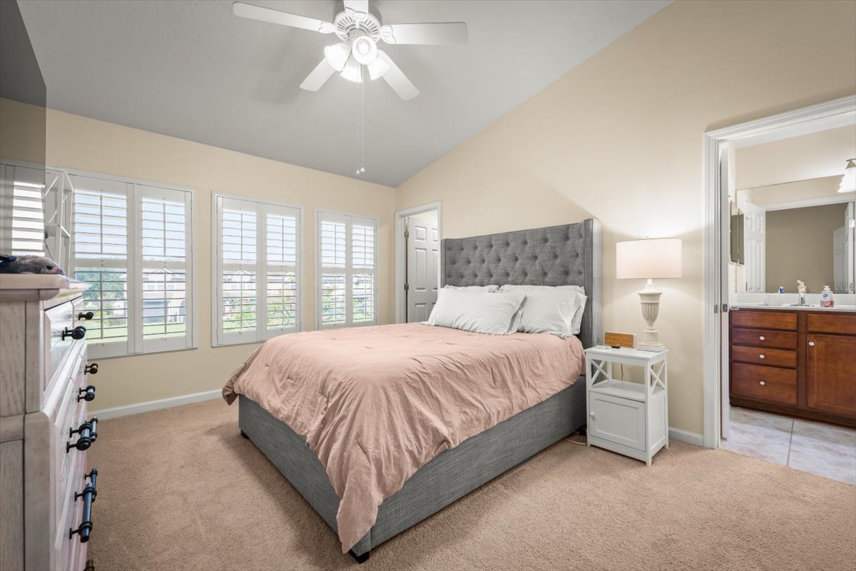 13406 English Peak Ct primary bedroom with large walkin closet.jpg