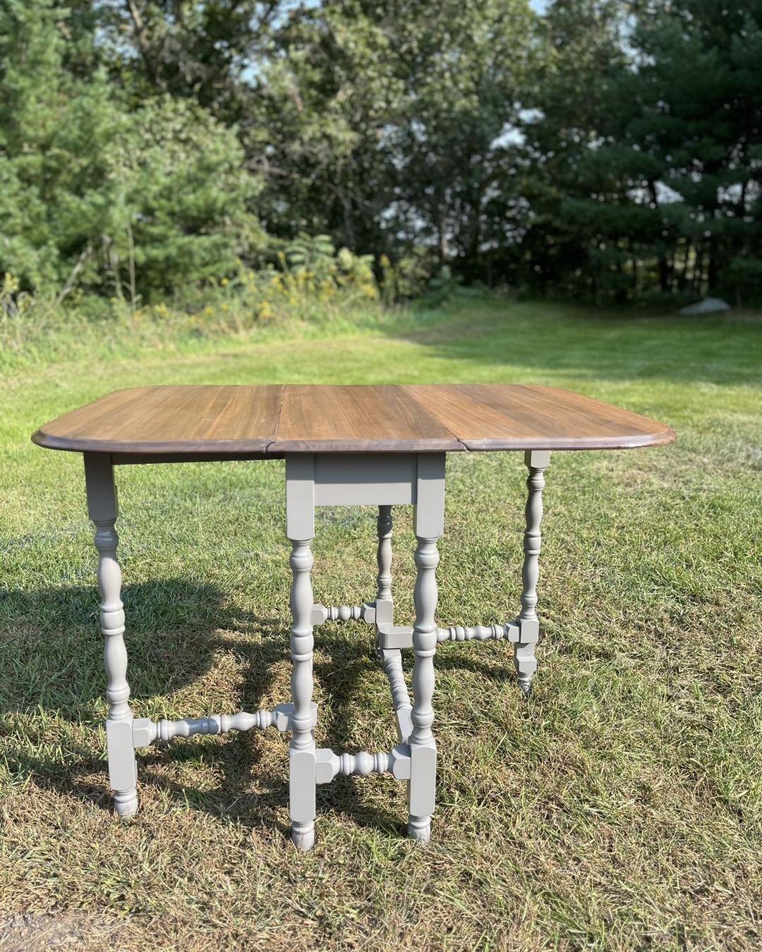 Coming Soon!

Refinished Wooden Antique Drop Leaf Table 

Top was stripped sanded &amp; stained.
The base was sanded, cleaned, then painted with enamel paint in a sprayer.
Entire piece sealed in poly topcoat.

Thank you for looking!
32&quot; wide 30&